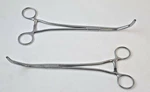 Pair Of V. Mueller Curved Intestinal Clamp Forceps 9.5". Fixed Price $85.00.