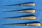Set Of 4 Boss/codman 70-7102/1Q88R Brun Curettes 8" (3), 9" (1). Fixed Price $150.00.