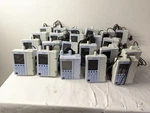 Lot Of 22 Baxter Sigma Spectrum Infusion Pump W/ Pole Clamp. Fixed Price $1300.00.