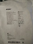 Stryker T7 Plus Zippered Togas With Peel Away Face Sheild. Fixed Price $190.00.