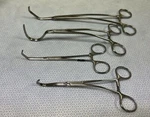 Set Of 4 Jarit Surgical Clamp Instruments. Fixed Price $250.00.