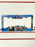 One Piece License Plate Frame With Luffy, Zoro, Nami, Chopper, Sanji, And Usopp. Fixed Price $25.00.