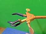 Fisher Castaloy Dual Adjustment Medium 3-PRONG Extension Clamp 60MM Grip 8.5. Fixed Price $16.09.